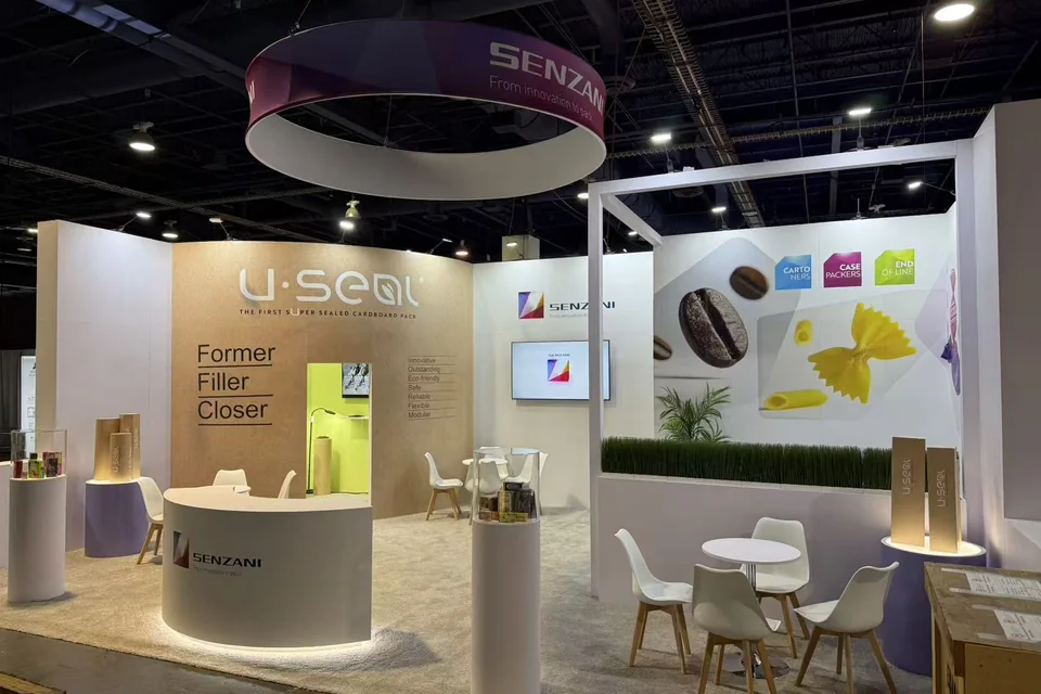 Second show-floor angle of the Senzani booth at PACK EXPO 2025