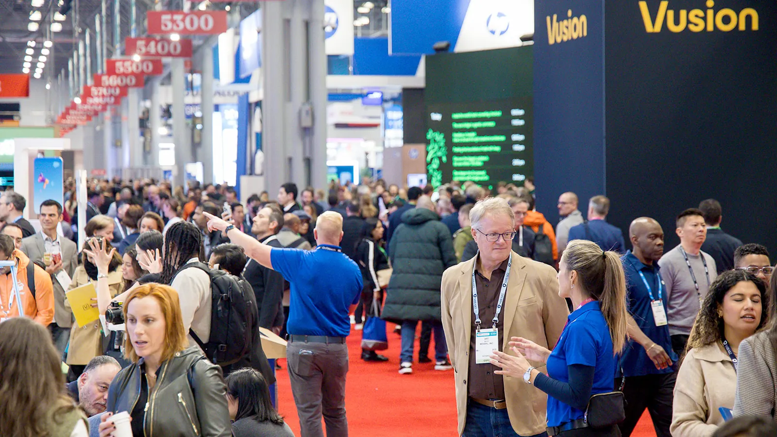 Attendees fill technology exhibition aisles at NRF Retail's Big Show.