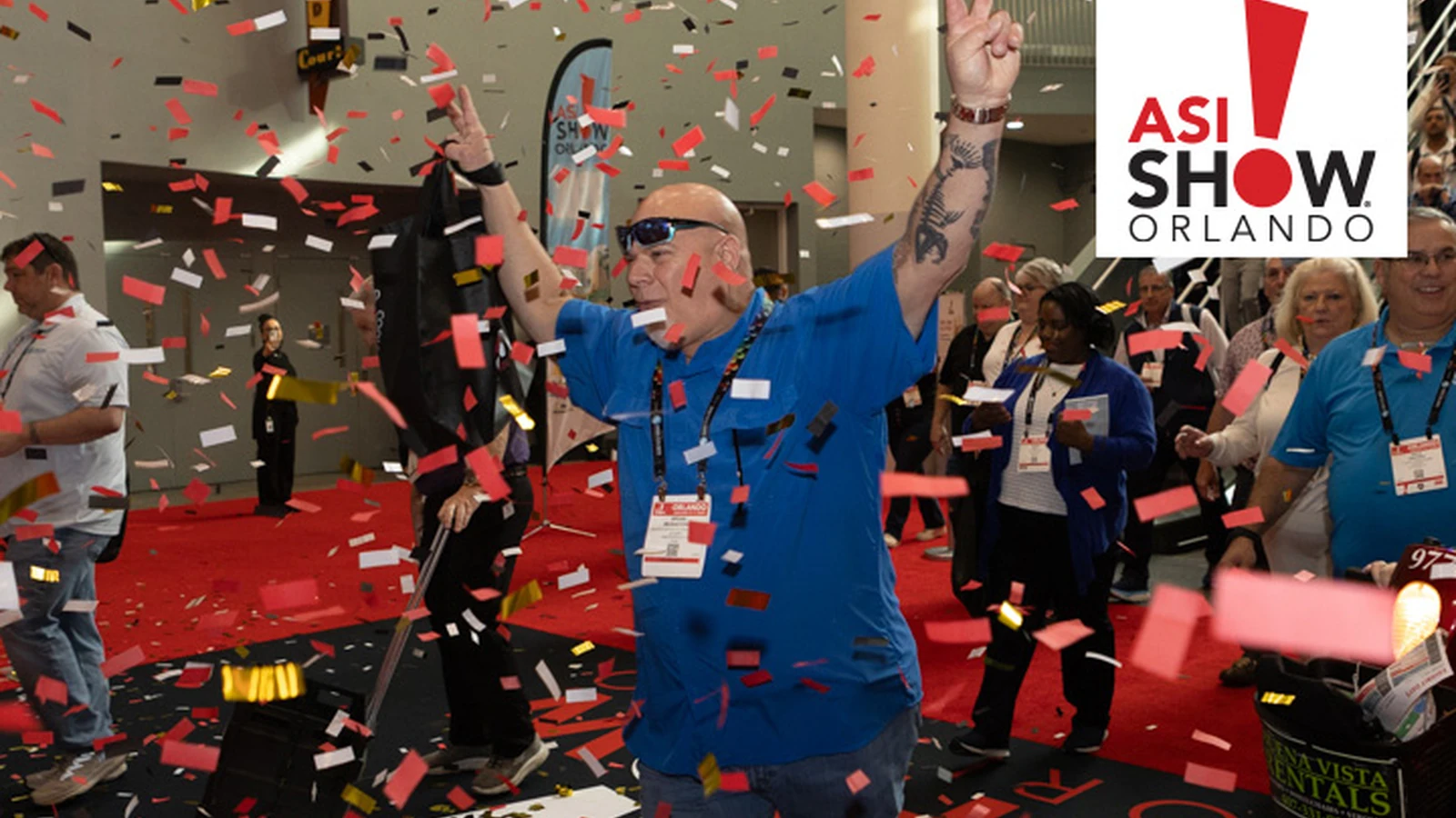 Confetti falls as attendees enter ASI Show Orlando.