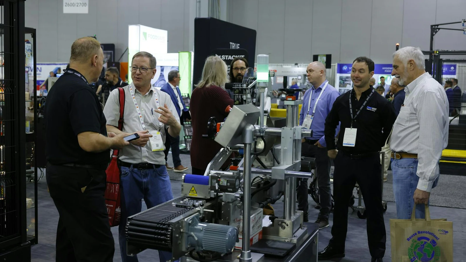 Attendees inspect packaging machinery at PACK EXPO Southeast.