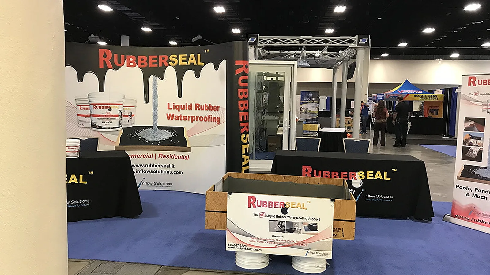A construction equipment exhibit on the Houston Build Expo floor.