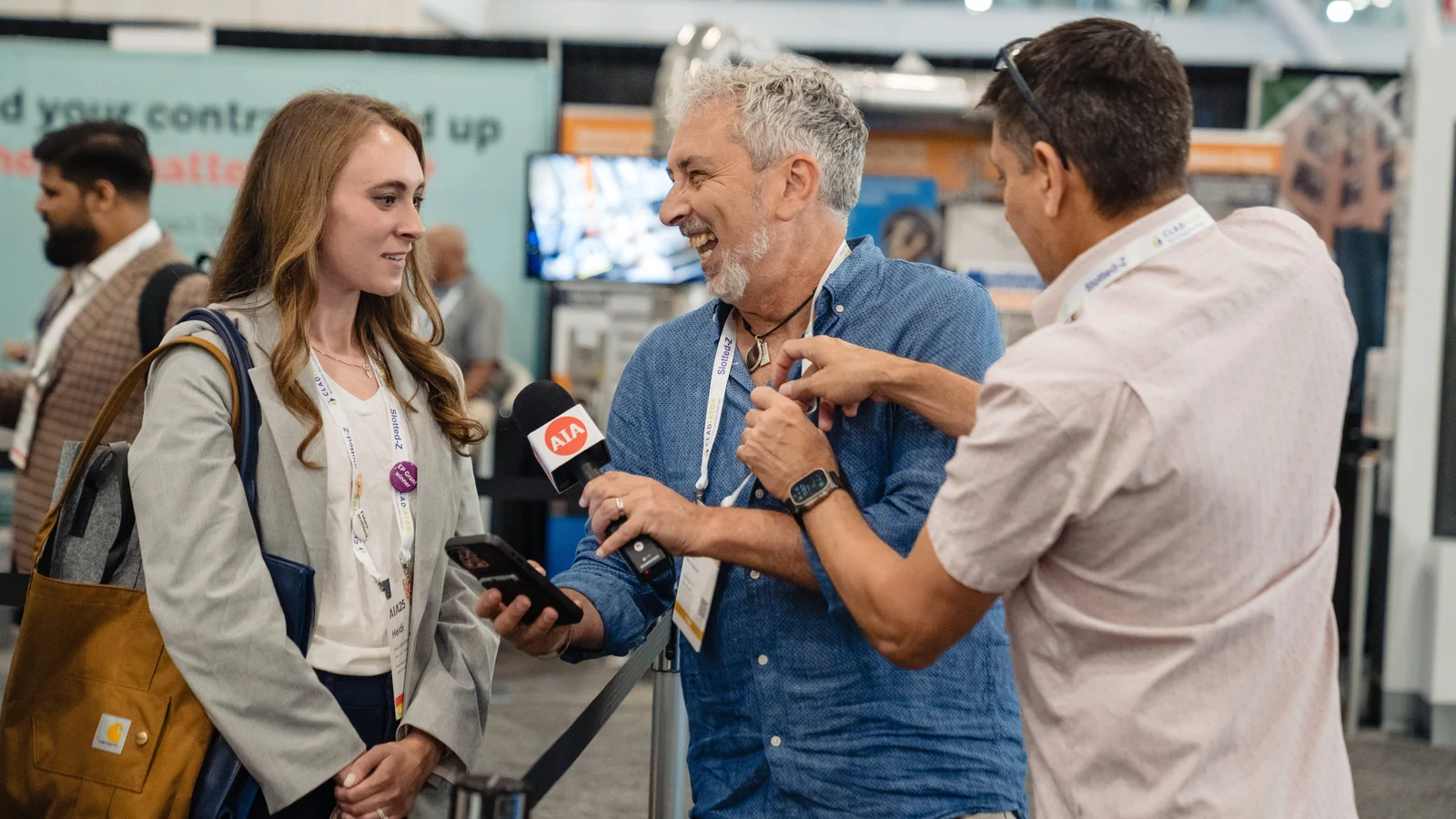AIA Conference attendees take part in an interview on the architecture expo floor.