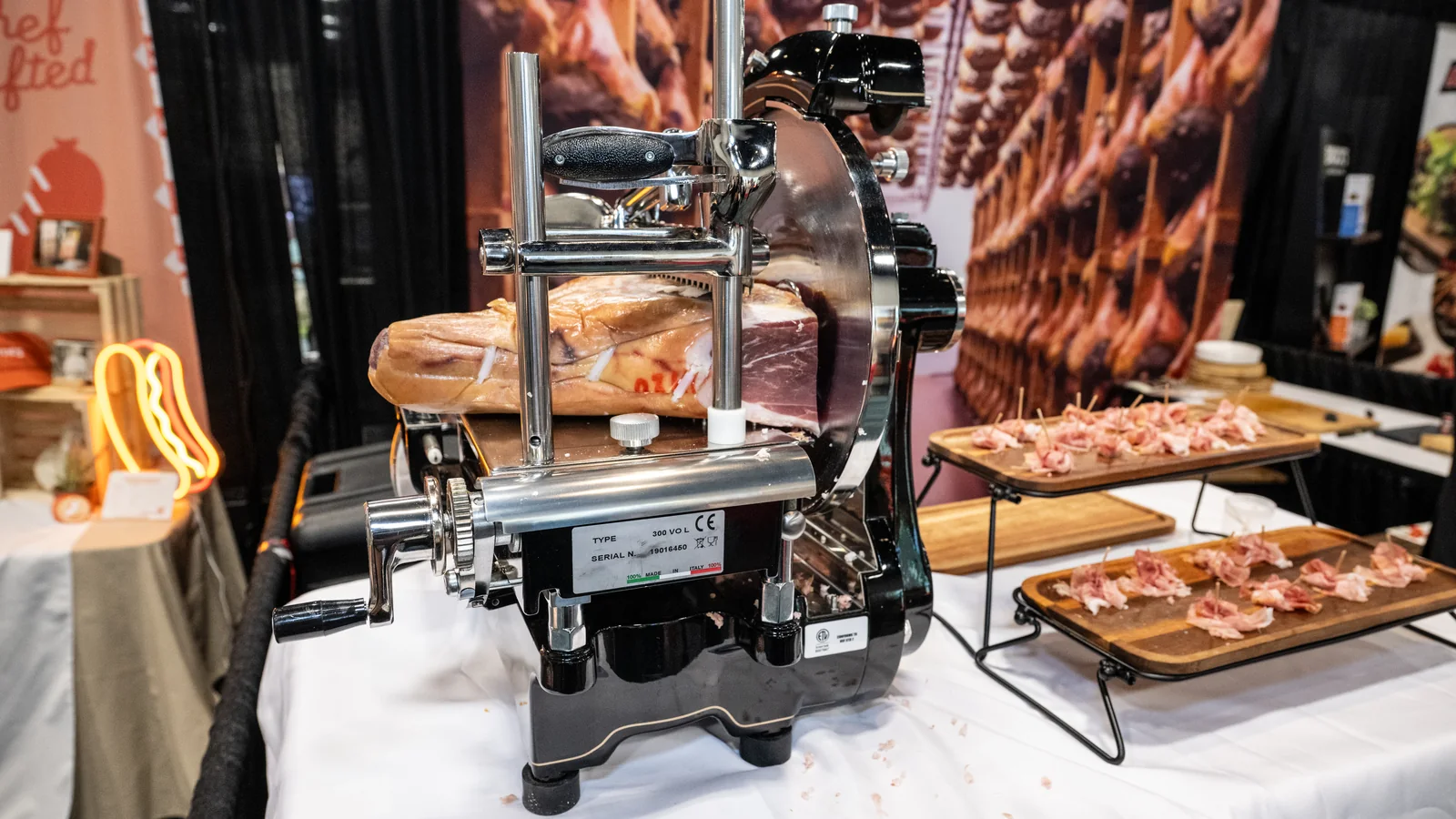 Annual Meat Conference exhibitor demonstrating meat products on the show floor