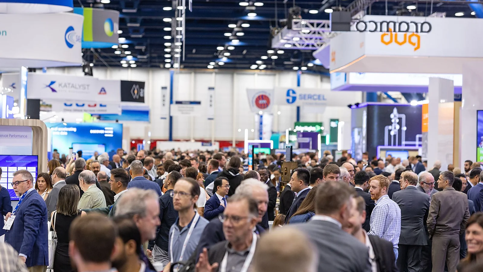Geoscience professionals network on the IMAGE exhibition floor in Houston.