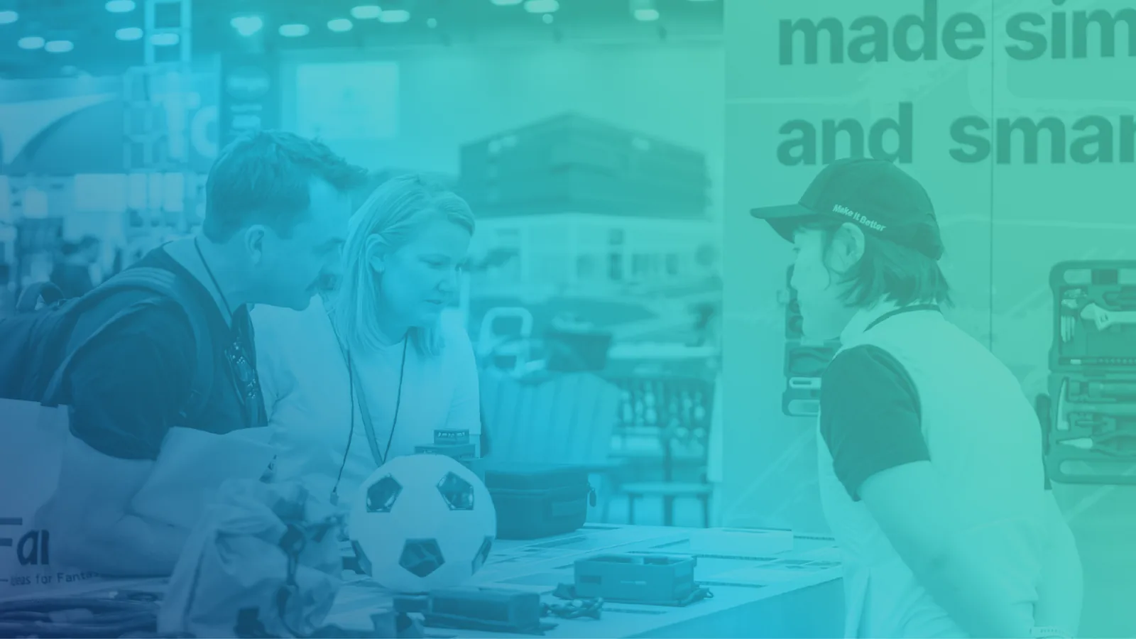 Buyers discuss products at a National Hardware Show / NHS Concept to Commerce predecessor event; contextual image for the future Hardlines Supplier Event.