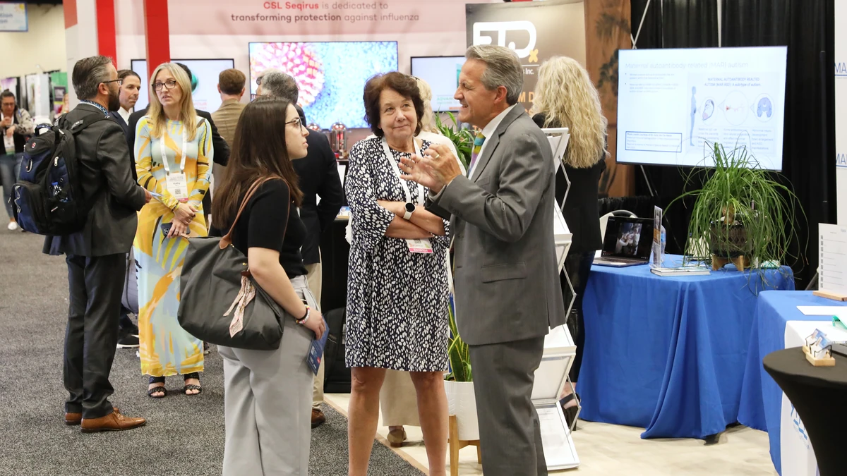 Pediatric professionals talking with exhibitors at a previous AAP National Conference and Exhibition.