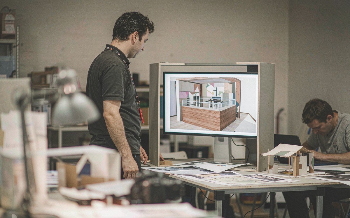 Unified Wine and Grape Symposium booth rental – exhibit design review with the project manager