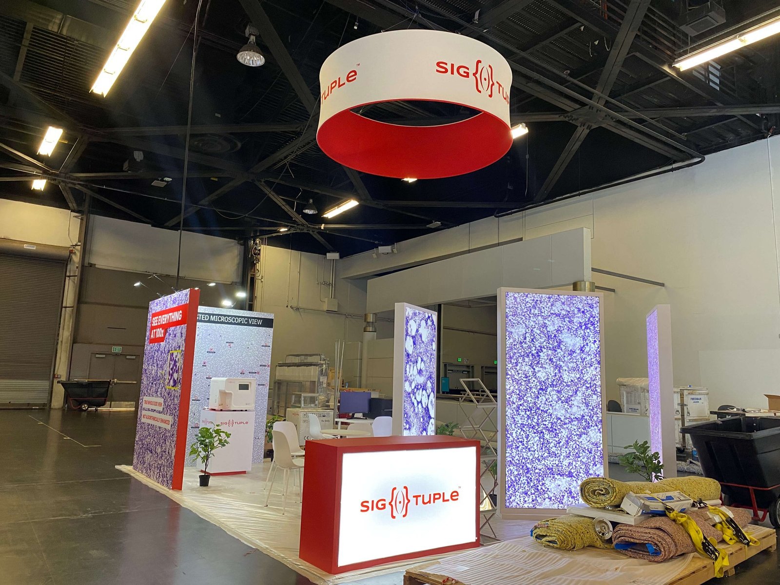 SigTuple 20'x20 trade show booth at AACC2023