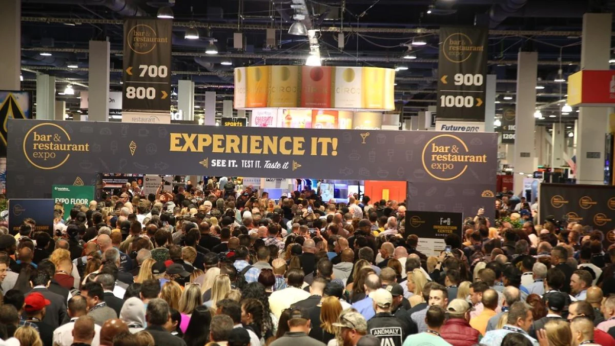 Attendees entering a previous Bar & Restaurant Expo show floor.
