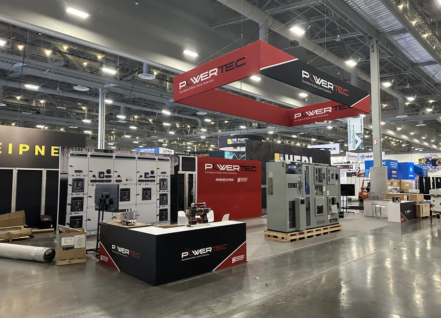 PowerTec exhibit at MINExpo 2024 with industrial equipment and an open inspection area