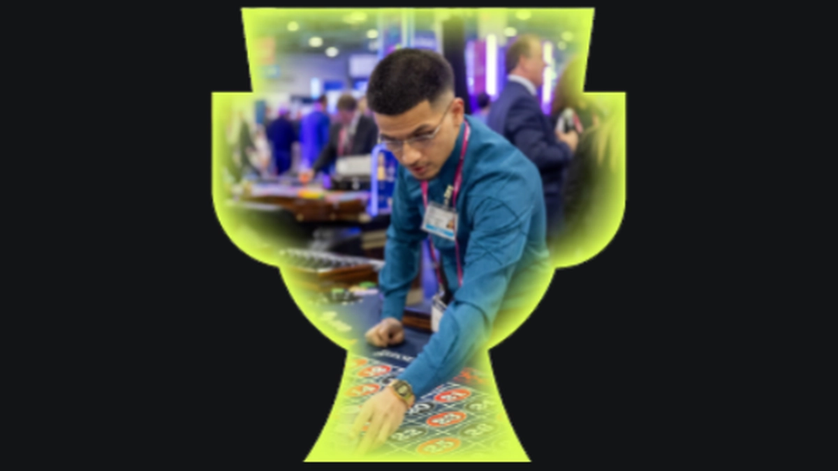 Dealer demonstrating a casino table game in a G2E promotional visual