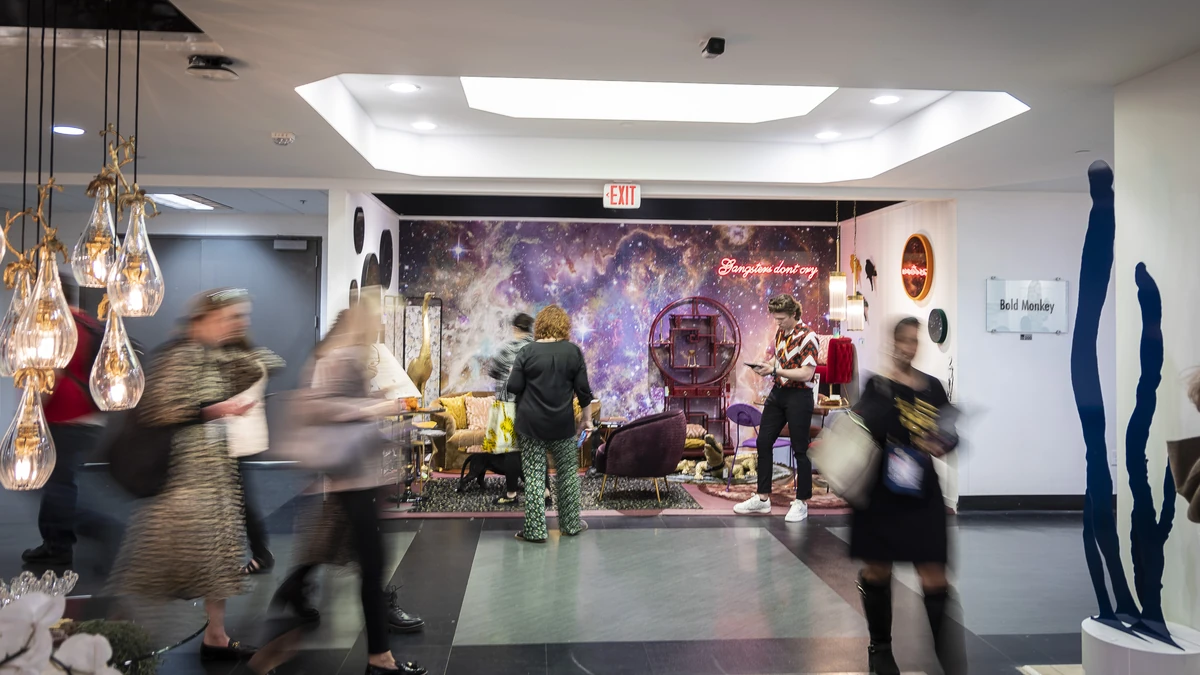 Buyers walking through a showroom during a previous High Point Market.