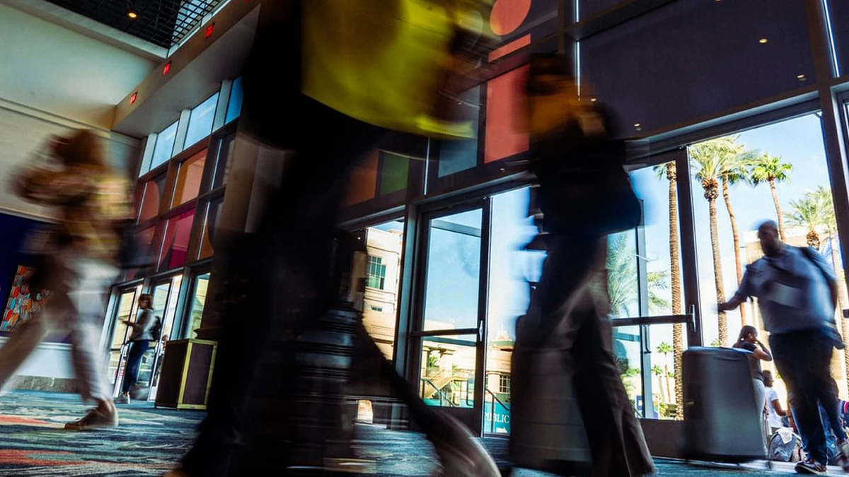 Attendees walking through the entrance to a previous IMEX America event.