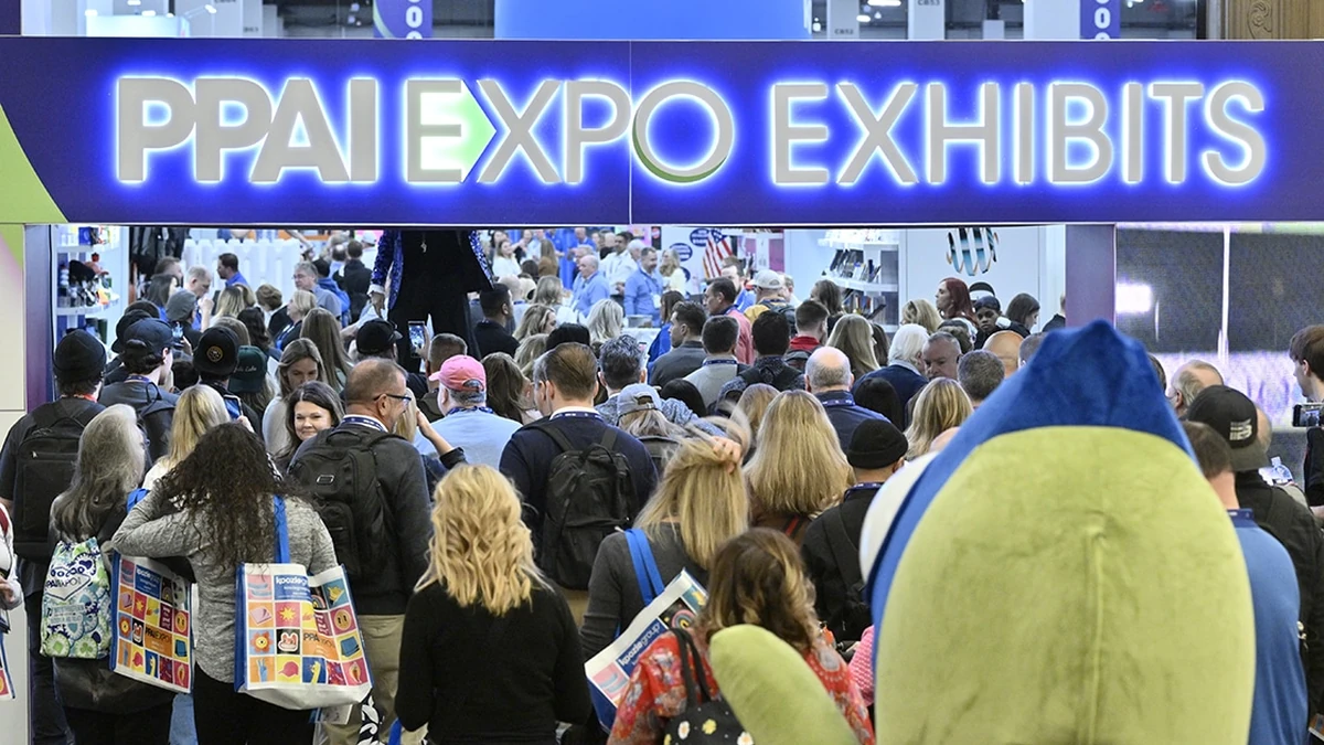 Attendees entering the PPAI Expo exhibits hall