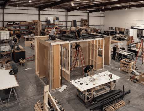 Wood booth structure during workshop pre-build