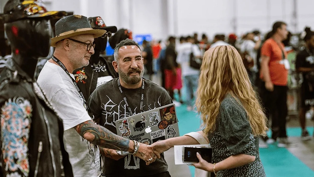 Fashion buyers and exhibitors meeting at a previous PROJECT Las Vegas event.