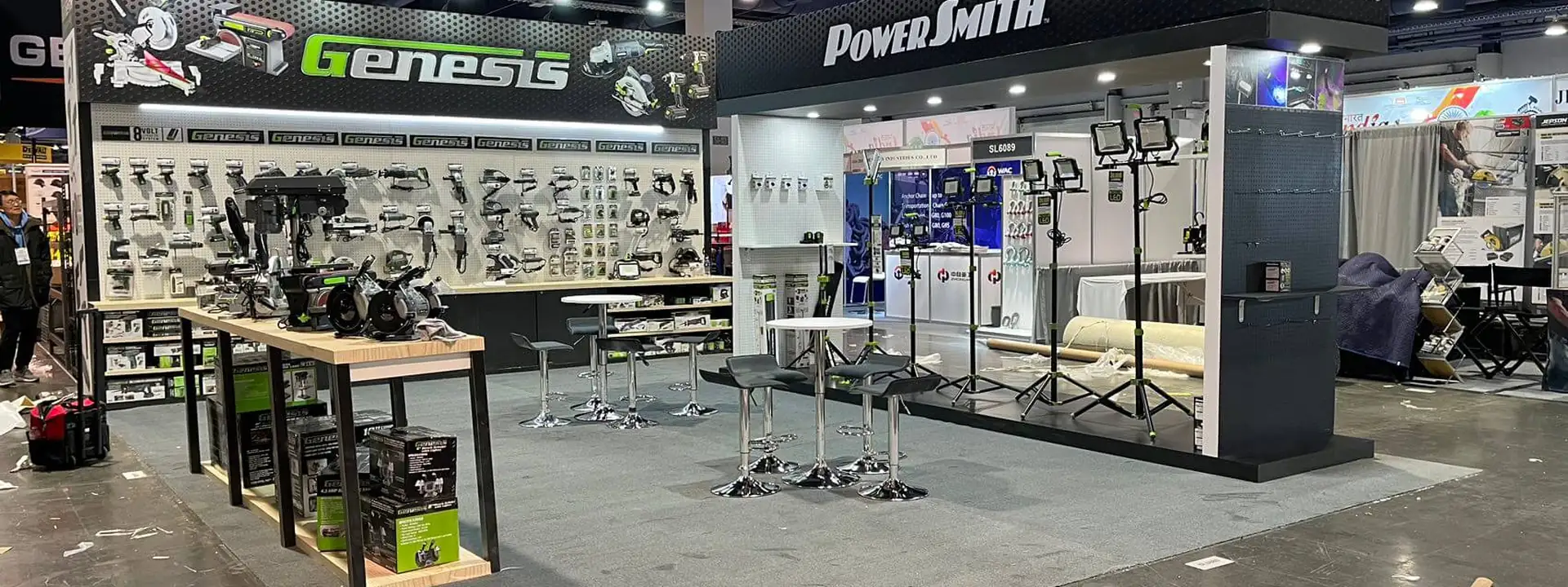 Completed Richpower exhibit with tool displays, black branded structures, product tables, and open demonstration space.