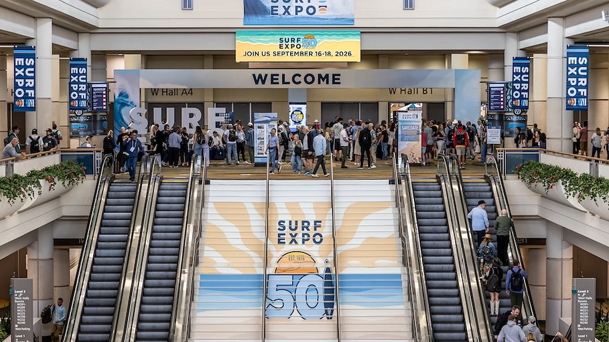 Surf Expo entrance signage and attendees inside the Orange County Convention Center