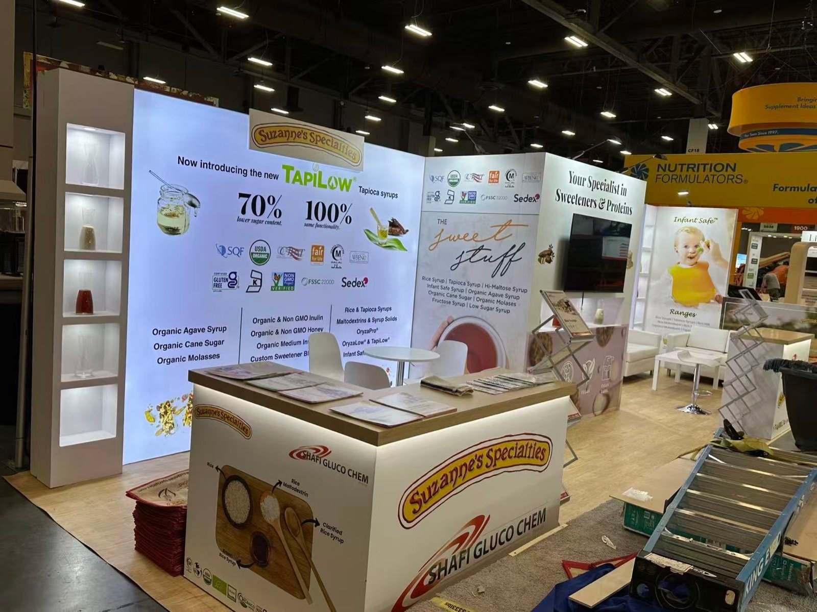 Suzanne's 10x30 trade show booth display at IBIE 2025
