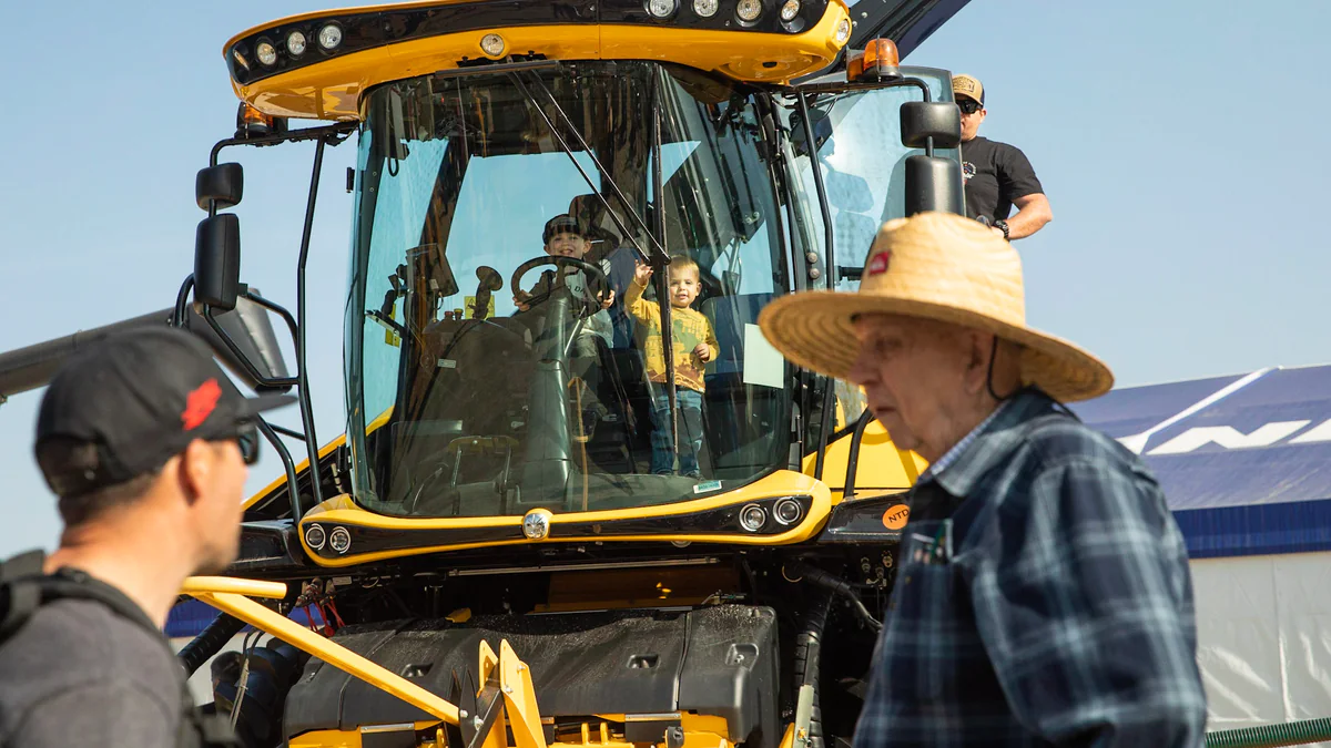 Attendees inspecting agricultural equipment at a previous World Ag Expo